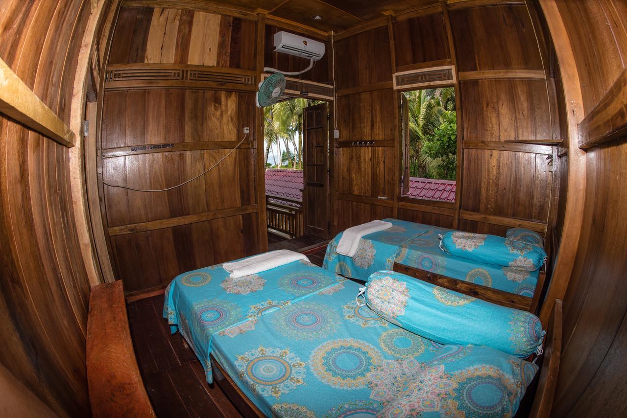 Puri Asu Resort Palau Asu Bagian luar foto